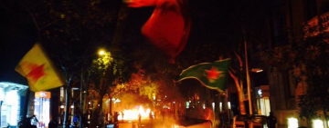 YPG and SDF flags on separatist barricade in Barcelona